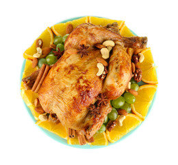 whole roasted chicken with grapes, oranges and spices