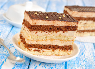 Chocolate cake on a blue table