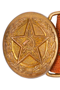 Old Soviet buckle of a soldier's belt on a white background.