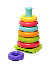 Plastic toy pyramid on a white background
