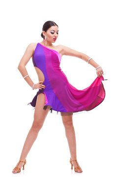 salsa woman dancer holds her dress