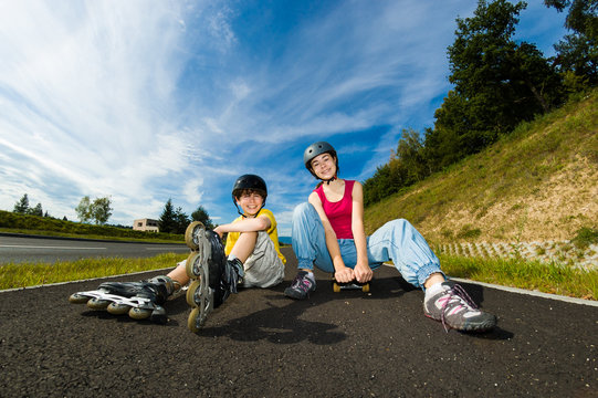 Active young people - rollerblading, skateboarding