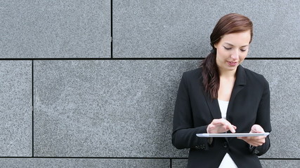 Businesswoman with tablet PC - Powered by Adobe