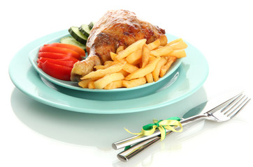 Roast chicken with french fries and vegetables