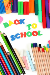 The words 'Back to School' composed of letters with various