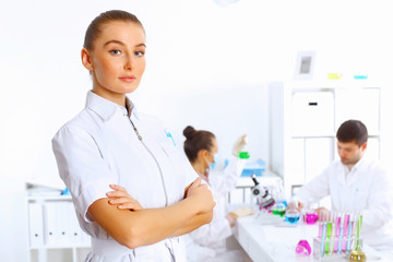 Young female doctor in white uniform