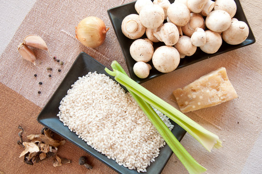 ingredients for mushroom risotto served with cheese