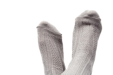 feet with gray socks isolated on white
