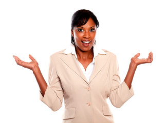 Stylish businesswoman looking at you with arms up