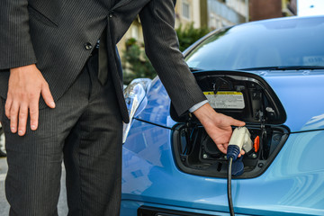 Man with eco car