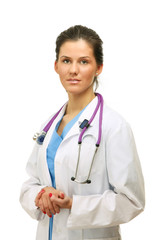 Fototapeta premium Young female doctor with a clipboard looking