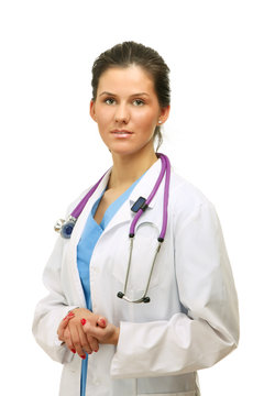 Young female doctor with a clipboard looking