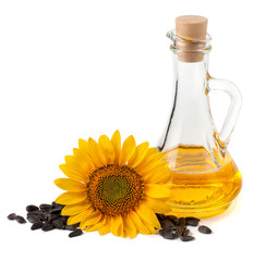 Sunflower oil with flower and seeds. On a white background