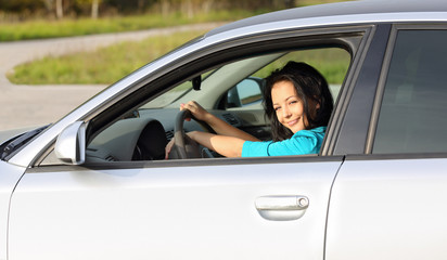 Pretty girl in a car