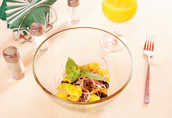Salad with pieces of oranges and red onions
