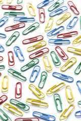 colorful paperclips on white