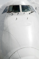 detail of aircraft nose with cockpit window