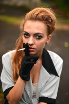 Beautiful Young Woman smoking
