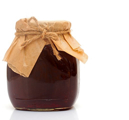 Strawberry jam isolated on white