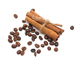 Cinnamon and coffee on white