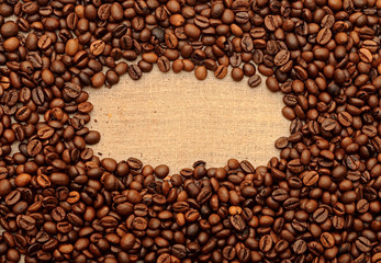 Old burlap and coffee beans background