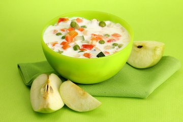tasty dieting food, on green background