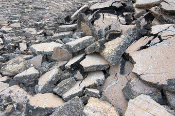Asphalt demolition debris from the road.