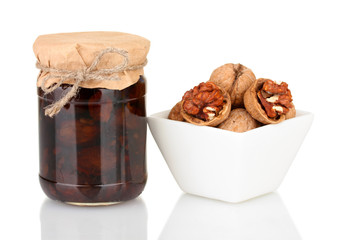 jam-jar of walnuts and plate with walnuts