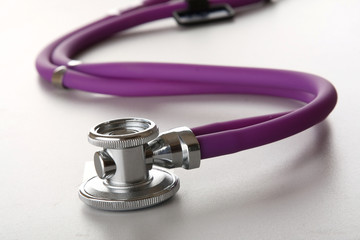 Closeup of a medical stethoscope, isolated on white