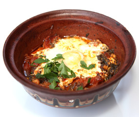Ceramic clay pot for cooking isolated on white background.