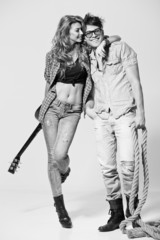 Sexy man and woman doing a fashion shoot bw retro look
