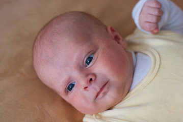Adorable baby boy with blue eyes