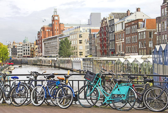 Amsterdam canal and bikes © TravelWorld