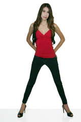 Young Slender Hispanic Woman Standing Jeans Heels