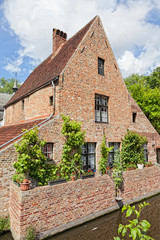 Fototapeta na wymiar Beautiful rural, brick house in the Dutch style