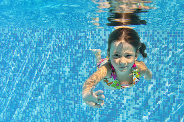 Happy underwater child in swimming pool,kids sport