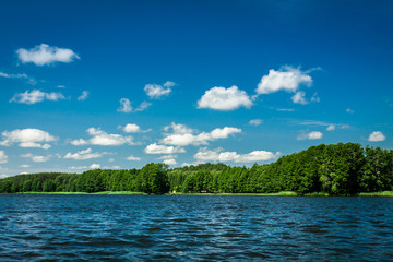 Blue lake and sky in summer - obrazy, fototapety, plakaty