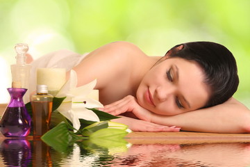 beautiful woman relaxing in spa