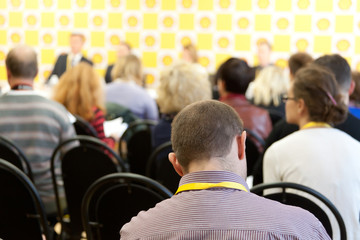 businessmen work at a conference