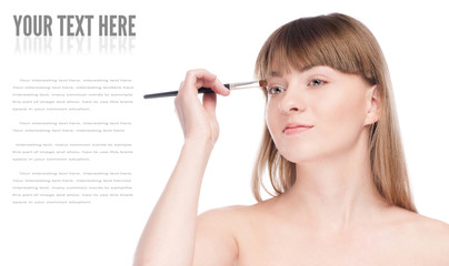 Fototapeta premium Beautiful woman with make up brush
