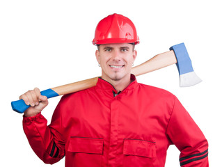 Young smiling fireman with hard hat, uniform holding ax