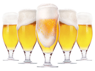Frosty glass of light beer isolated