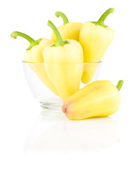 Fresh Yellow bell peppers in Glass bowl isolated on a white back
