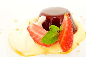 Strawberry Pudding with yellow sauce