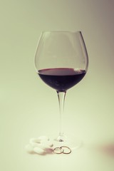 Red Wine with Wedding Rings