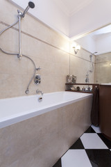 Bathroom with black and white tiles