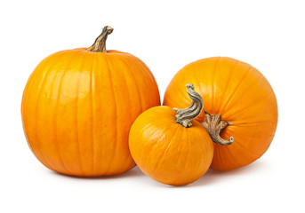 three yellow pumpkin on a white background
