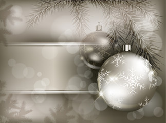 Christmas baubles with snowflake on branch