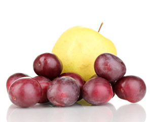 ripe sweet apple and plums isolated on white