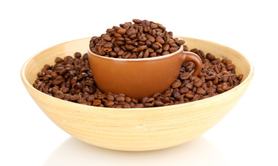 Coffee beans in bamboo bowl with cup isolated on white